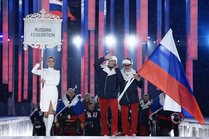 Представители России во время парада атлетов и членов национальных делегаций на церемонии открытия XI зимних Паралимпийских игр в Сочи